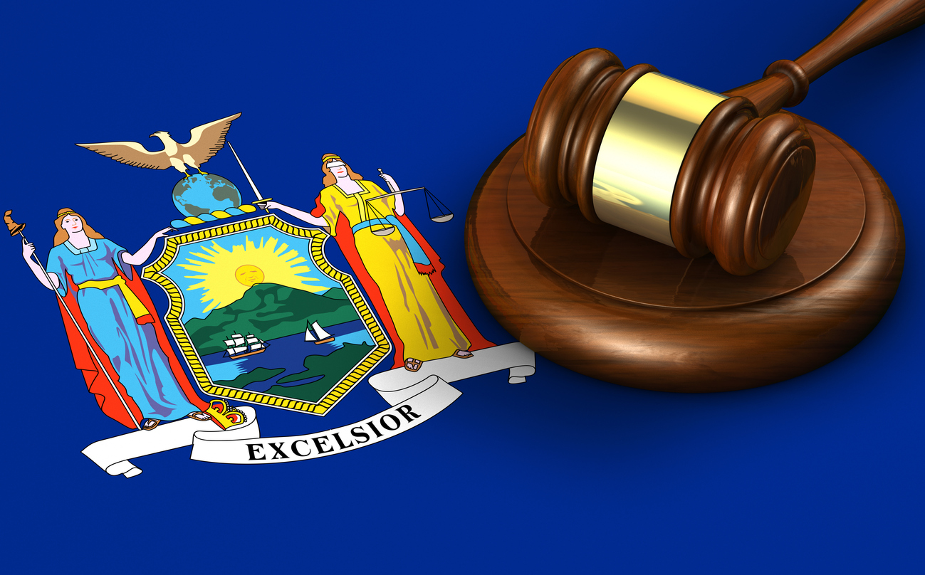 Judge's gavel and emblem of New York State.